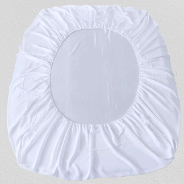 white cotton bed sheet